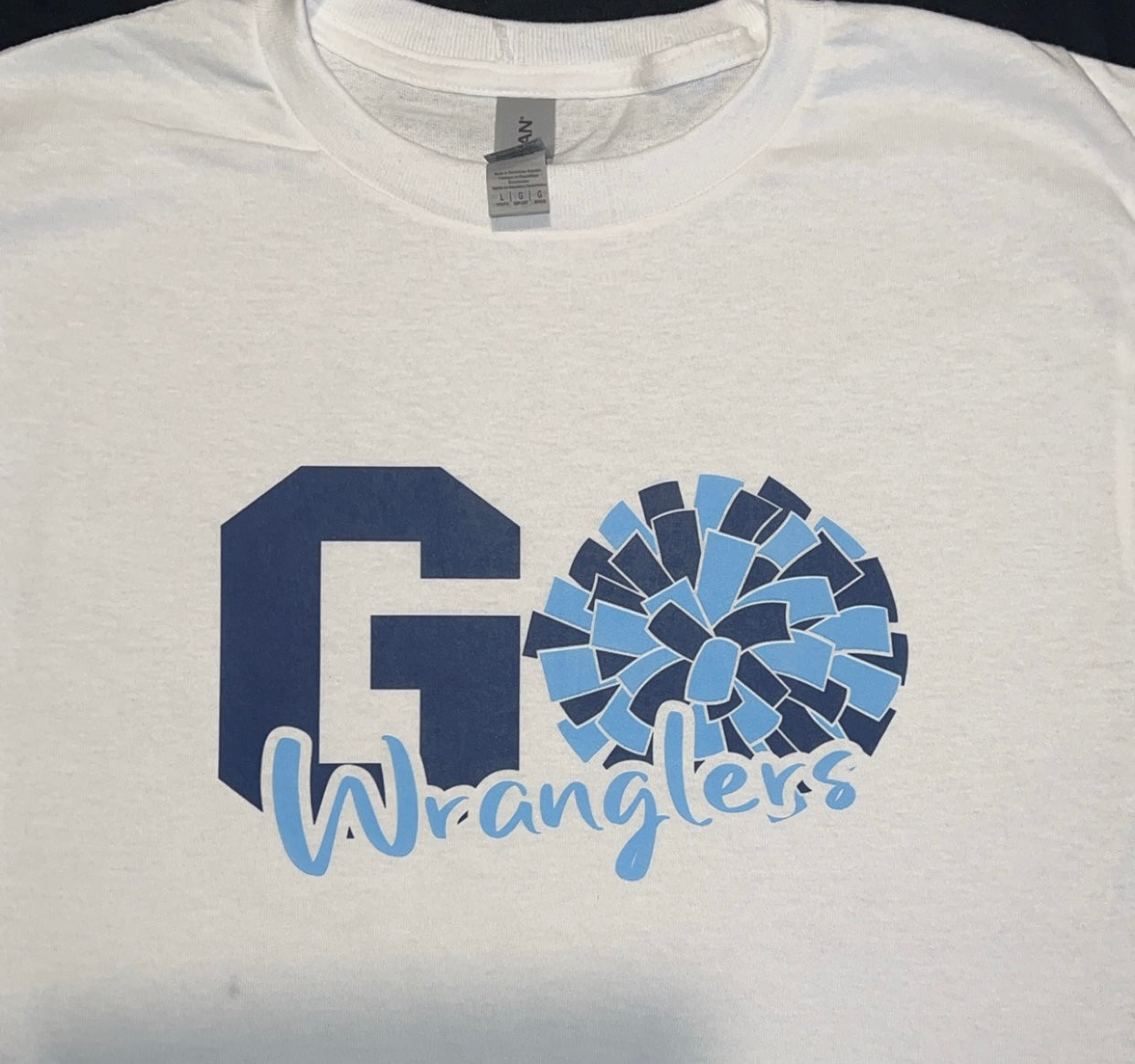 Legacy Ranch Go Wrangler’s pompom tshirt!